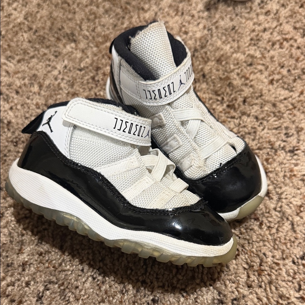 Jordan Kids Black and White High-Top Sneakers